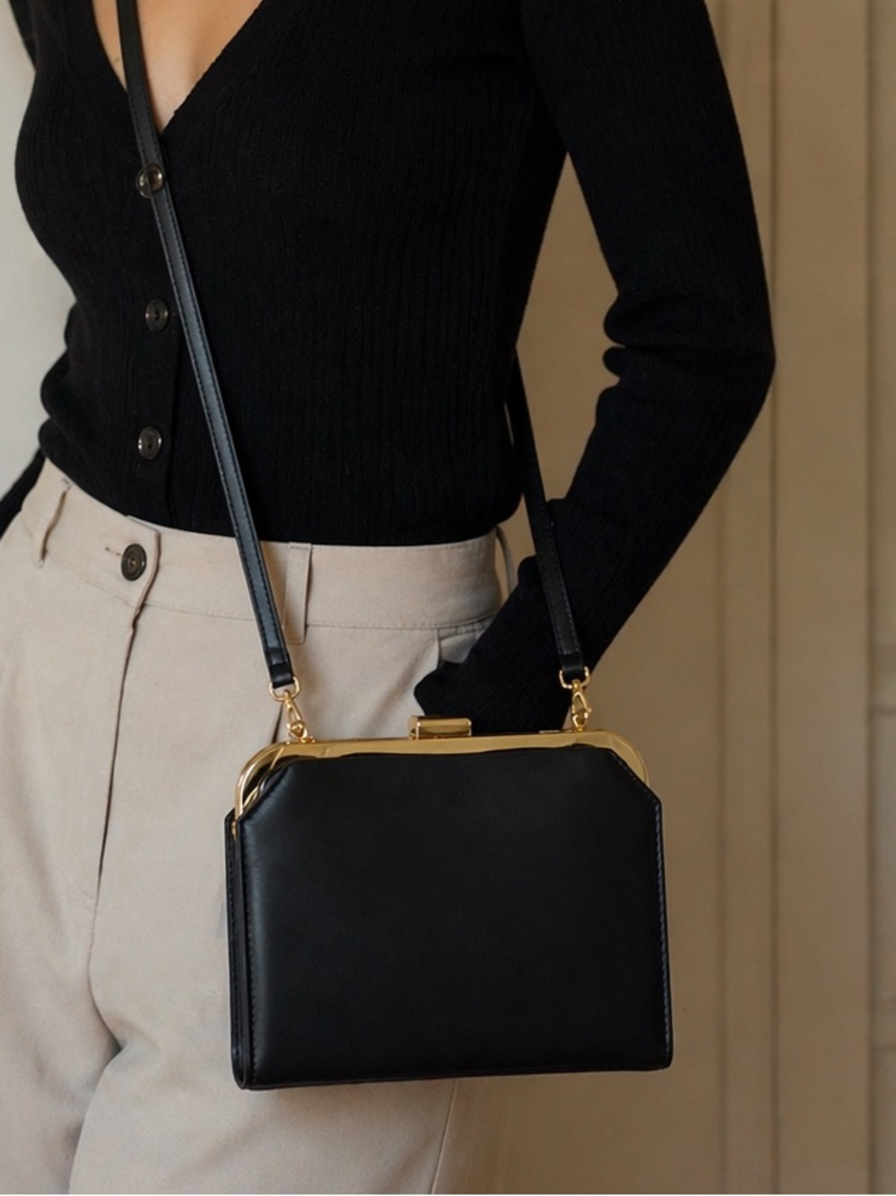 Classic Black Crossbody Bag with Gold Trim
